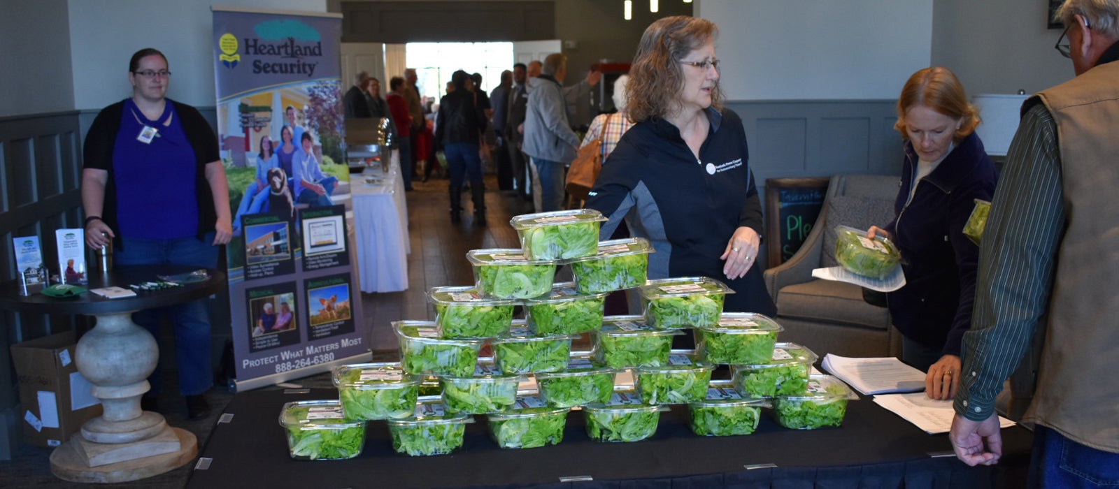 Jan giving away Lettuce Abound.